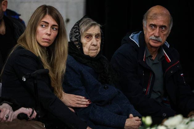 RUSSIA, MOSCOW - SEPTEMBER 30, 2026: Music critic Sergei Sosedov s mother is seen during her son s farewell ceremony at Troyekurovskoye Cemetery. Sosedov died in an accident in the Republic of Sakha (Yakutia) on September 23, at the age of 59. Artyom Geodakyan TASS  98560925