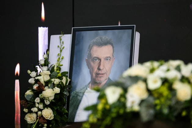 RUSSIA, MOSCOW - SEPTEMBER 30, 2026: A portrait of late music critic Sergei Sosedov, is seen during a farewell ceremony at Troyekurovskoye Cemetery. Sosedov died in an accident in the Republic of Sakha (Yakutia) on September 23, at the age of 59. Artyom Geodakyan TASS  98564088
