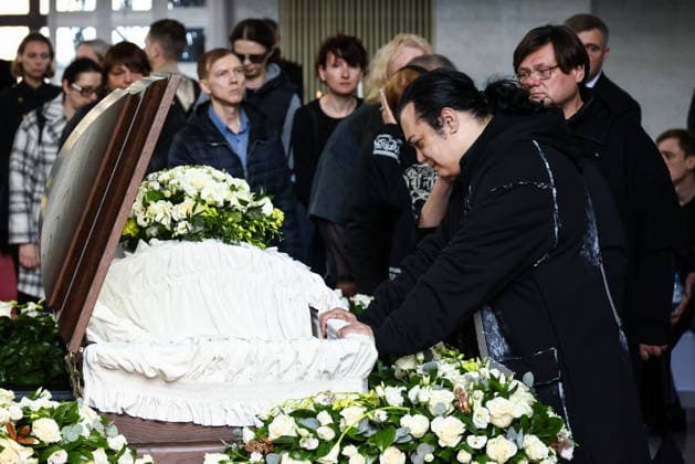 RUSSIA, MOSCOW - SEPTEMBER 30, 2026: Singer Igor Nadzhiyev (R) attends a farewell ceremony for music critic Sergei Sosedov at Troyekurovskoye Cemetery. Sosedov died in an accident in the Republic of Sakha (Yakutia) on September 23, at the age of 59. Artyom Geodakyan TASS 98566130