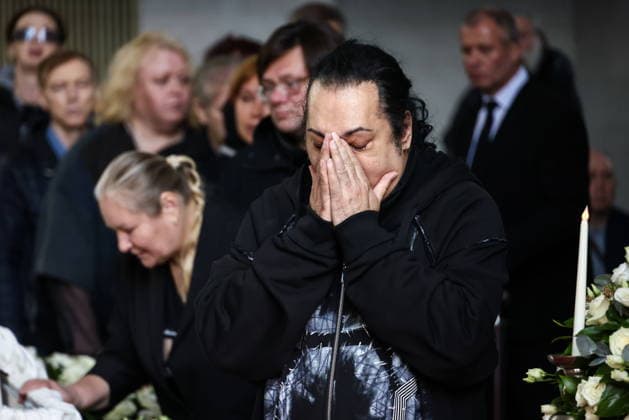 RUSSIA, MOSCOW - SEPTEMBER 30, 2026: Singer Igor Nadzhiyev (R) attends a farewell ceremony for music critic Sergei Sosedov at Troyekurovskoye Cemetery. Sosedov died in an accident in the Republic of Sakha (Yakutia) on September 23, at the age of 59. Artyom Geodakyan TASS 98566138