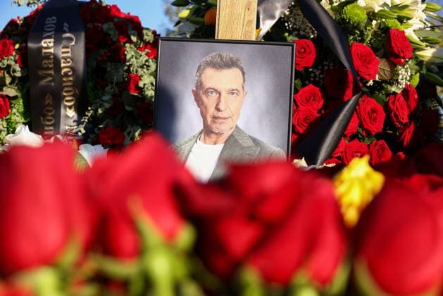 RUSSIA, MOSCOW - SEPTEMBER 30, 2026: A portrait of late music critic Sergei Sosedov is seen at his grave at Perepechinskoye Cemetery. Sosedov died in an accident in the Republic of Sakha (Yakutia) on September 23, at the age of 59. Artyom Geodakyan TASS  98576703