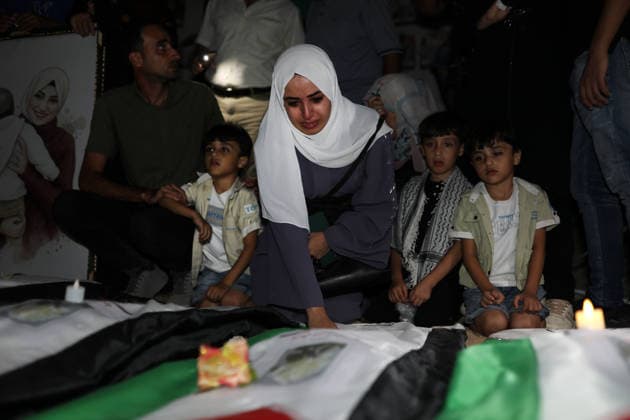 Gaza Families Bid Farewell to 105 Recovered Bodies Mourners bid farewell to the remains of 105 Palestinians recovered from beneath the rubble of the al-Taj block on al-Yarmouk Street in Gaza City on September 30, 2026. The Civil Defense said recovery efforts were carried out in coordination with an Egyptian committee, ahead of the burial of the remains. Photo by Belal Osama apaimages Gaza Gaza Strip Palestinian Territory 300926_Gaza_BO_00(13) Copyright: xapaimagesxBelalxOsamax xapaimagesx
