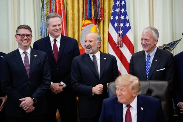 Rep. Nick Begich, R-AK, Alaska Governor Mike Dunleavy, Commerce Secretary Howard Lutnick, and Sen. Dan Sullivan, R-AK, look on as President Donald Trump makes an announcement with Secretary of Commerce in the Oval Office of the White House in Washington on September 30, 2026. The Trump Administration announced South Korea will invest $54 billion toward the Alaska Liquefied Natural Gas (LNG) project as part of a broader $200 billion investment in U.S. energy projects.  WASP20260930168 YURIxGRIPAS