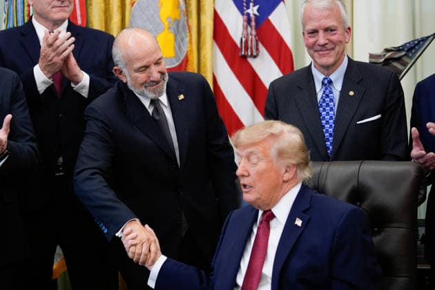 Secretary of Commerce Howard Lutnick shakes hands with President Donald during an announcement in the Oval Office of the White House in Washington on September 30, 2026. The Trump Administration announced South Korea will invest $54 billion toward the Alaska Liquefied Natural Gas (LNG) project as part of a broader $200 billion investment in U.S. energy projects.  WASP20260930170 YURIxGRIPAS