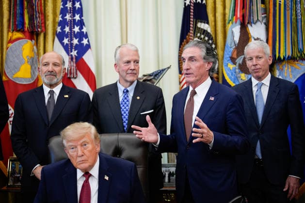 Secretary of the Interior Doug Burgum peaks during an announcement with President Donald Trump in the Oval Office of the White House in Washington on September 30, 2026. The Trump Administration announced South Korea will invest $54 billion toward the Alaska Liquefied Natural Gas (LNG) project as part of a broader $200 billion investment in U.S. energy projects.  WASP20260930175 YURIxGRIPAS