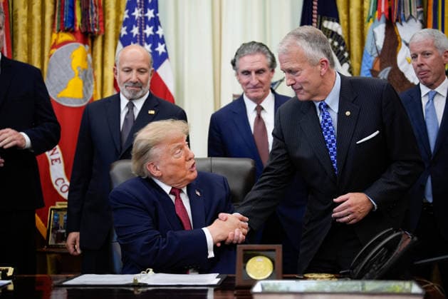President Donald Trump shakes hands with Sen. Dan Sullivan, R-AK, during an announcement in the Oval Office of the White House in Washington on September 30, 2026. The Trump Administration announced South Korea will invest $54 billion toward the Alaska Liquefied Natural Gas (LNG) project as part of a broader $200 billion investment in U.S. energy projects.  WASP20260930177 YURIxGRIPAS