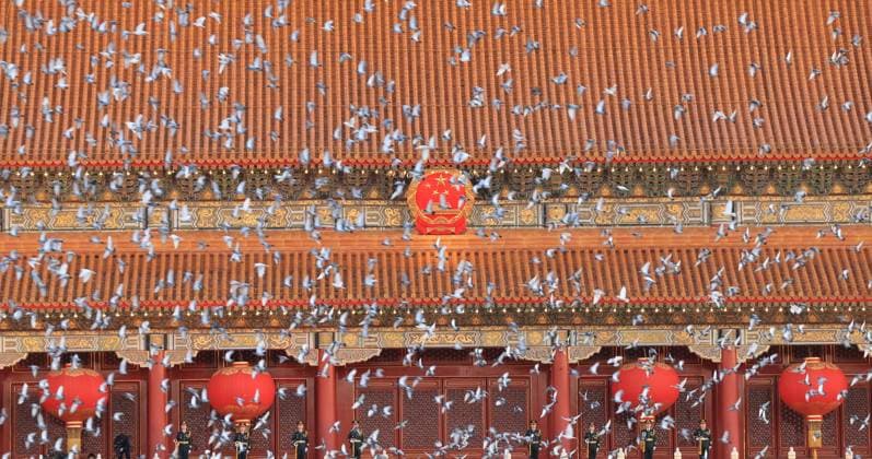 (261001) -- BEIJING, Oct. 1, 2026 -- Doves are released after a flag-raising ceremony marking the 77th anniversary of the founding of the People s Republic of China at Tian anmen Square in Beijing, capital of China, Oct. 1, 2026. ) CHINA-BEIJING-NATIONAL DAY-FLAG-RAISING CEREMONY (CN) YinxGang