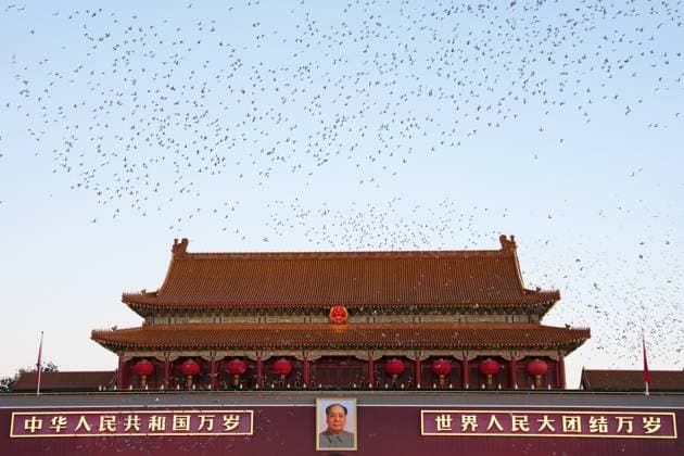 (261001) -- BEIJING, Oct. 1, 2026 -- Doves are released after a flag-raising ceremony marking the 77th anniversary of the founding of the People s Republic of China at Tian anmen Square in Beijing, capital of China, Oct. 1, 2026. ) CHINA-BEIJING-NATIONAL DAY-FLAG-RAISING CEREMONY (CN) JuxHuanzong 