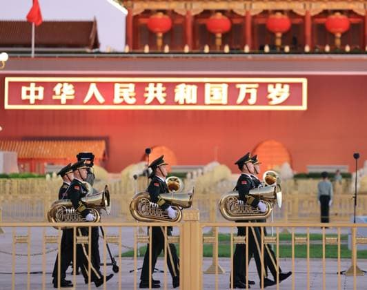 (261001) -- BEIJING, Oct. 1, 2026 -- A flag-raising ceremony marking the 77th anniversary of the founding of the People s Republic of China is held at Tian anmen Square in Beijing, capital of China, Oct. 1, 2026. ) CHINA-BEIJING-NATIONAL DAY-FLAG-RAISING CEREMONY (CN) YinxGang