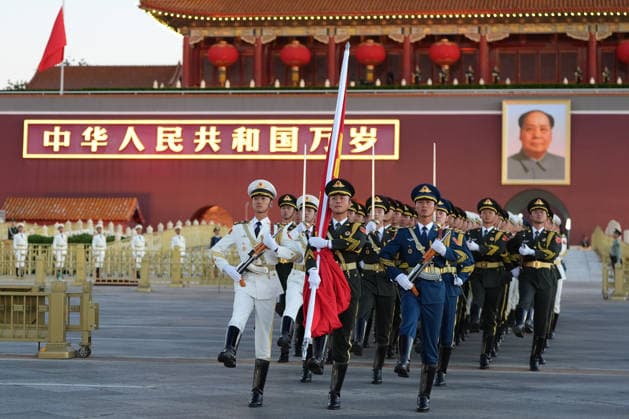 (261001) -- BEIJING, Oct. 1, 2026 -- A flag-raising ceremony marking the 77th anniversary of the founding of the People s Republic of China is held at Tian anmen Square in Beijing, capital of China, Oct. 1, 2026. ) CHINA-BEIJING-NATIONAL DAY-FLAG-RAISING CEREMONY (CN) JuxHuanzong