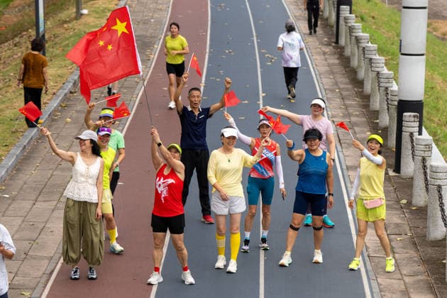 JINHUA, CHINA - OCTOBER 01: Citizens exercise on the smart running track along the Dongyang River at Aiqing Cultural Park in Jindong District on October 1, 2026 in Jinhua, Zhejiang Province of China. The activity takes place as the country prepares to celebrate the National Day holiday. Copyright: xVCGx 111670884314