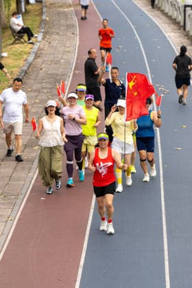 JINHUA, CHINA - OCTOBER 01: Citizens exercise on the smart running track along the Dongyang River at Aiqing Cultural Park in Jindong District on October 1, 2026 in Jinhua, Zhejiang Province of China. The activities mark the celebration of China s National Day. Copyright: xVCGx 111670884310
