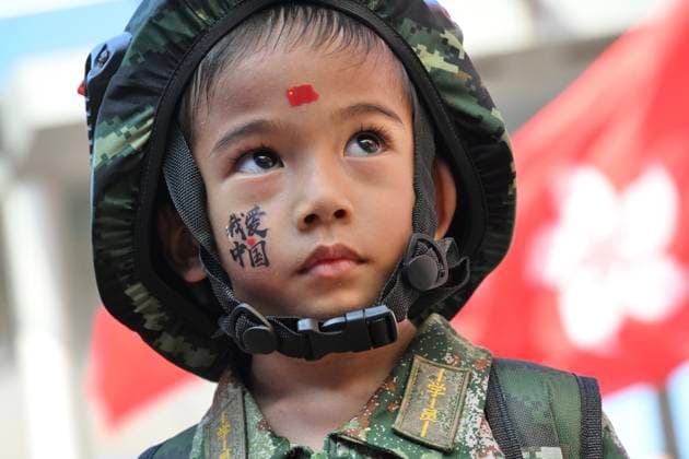 RECORD DATE NOT STATED China s National Day In Hong Kong A child wearing Chinese military uniform on October 1, 2026 in Hong Kong. Today is the China s National Day. (Photo by STR Nexpher Images) Hong Kong