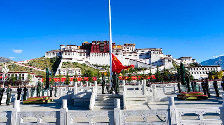 (261001) -- BEIJING, Oct. 1, 2026 -- A flag-raising ceremony marking the 77th anniversary of the founding of the People s Republic of China is held at the Potala Palace square in Lhasa, southwest China s Xizang Autonomous Region, Oct. 1, 2026. People celebrated the 77th anniversary of the founding of the People s Republic of China in various ways on Thursday. ) CHINA-NATIONAL DAY-CELEBRATION (CN) JigmexDorje