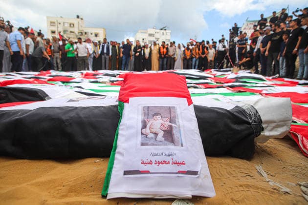 Funeral Held For Palestinians Killed In Israel-Hamas War - Gaza A mass funeral takes place for 110 Palestinians who were killed in Israeli strikes early in the Israel-Hamas war on October 1, 2026 in Gaza City, Gaza. The remains of the victims have recently been recovered from the rubble of buildings destroyed in the Al-Taj area of Gaza City. Ramez Photo by Habboub ABACAPRESS.COM Gaza Palestine  Copyright: xHabboubxRamez ABACAx