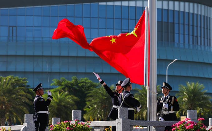 (261001) -- HAIKOU, Oct. 1, 2026 -- A flag-raising ceremony marking the 77th anniversary of the founding of the People s Republic of China is held at Xinhai Harbour in Haikou, south China s Hainan Province, Oct. 1, 2026. ) CHINA-HAINAN-NATIONAL DAY-FLAG-RAISING CEREMONY (CN) YangxGuanyu