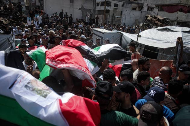 Palestinians Hold Mass Funeral for 105 Recovered from Gaza Rubble Palestinians take part in a mass funeral for 105 Palestinians whose remains were recovered from beneath the rubble of destroyed buildings in the al-Taj area of Gaza City’s al-Yarmouk neighborhood on October 1, 2026. The victims, including women and children, were killed in Israeli airstrikes during the early stages of the war, with families gathering for their funeral and burial after their remains had been trapped under the rubble for years. Photo by Bilal Osama apaimages Gaza city Gaza Strip Palestinian Territory 011026_Gaza_BO_00(31) Copyright: xapaimagesxBilalxOsamax xapaimagesx