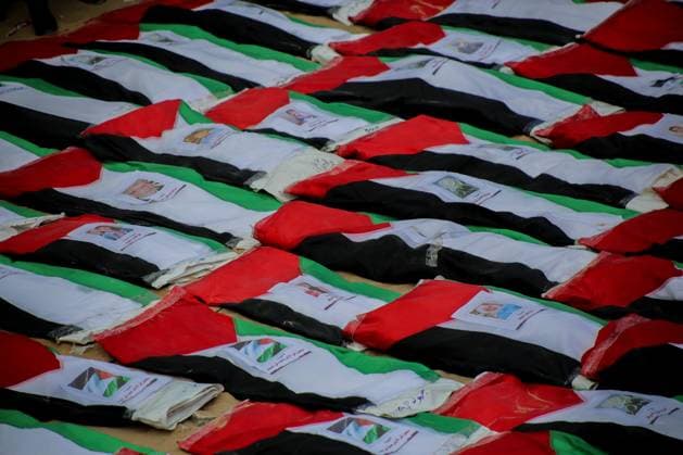 RECORD DATE NOT STATED Funeral Held for Palestinians Killed in Israel-Hamas War (INT) Funeral Held for Palestinians Killed in Israel-Hamas War. October 1, 2026, Gaza, Palestine: A mass funeral is held for 105 Palestinians who were killed in Israeli strikes during the early stages of the Israel-Hamas war. The remains of the victims were recently recovered from beneath the rubble of buildings destroyed in the Al-Taj area of Gaza City. Families and mourners gather to pay their respects. Credit: Hashem Zimmo TheNews2(Foto: Hashem Zimmo Thenews2 imago images) Funeral Held for Palestinians Killed in Israel-Hamas War  Copyright: xHashemxZimmox