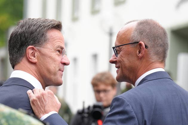 Visit by the German-Dutch Corps with Federal Chancellor Merz; Federal Chancellor Friedrich Merz stands shoulder to shoulder with NATO Secretary General Mark Ruette during the military honors presented by the 1st German-Dutch Corps, Münster, October 1, 2026, Münster, North Rhine-Westphalia, Germany