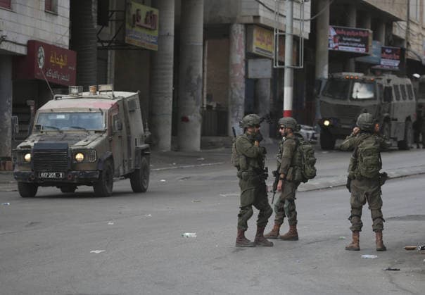 Israel enforces Security as Jewish visitors arrive to pray during the festival of Sukkot in Nablus, Palestine Israeli soldiers guard the street and secure the route surrounding Joseph s Tomb a religious site contested by Israelis and Palestinians as Jewish visitors arrive late at night to pray inside during the Jewish festival of Sukkot; the shrine is located in an area under Palestinian Authority control. Nablus Palestine Copyright: xNasserxishatyehx xSOPAxImagesx Nishtayeh676