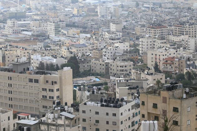 Israel enforces Security as Jewish visitors arrive to pray during the festival of Sukkot in Nablus, Palestine A view of the Joseph s Tomb shrine, situated amidst Palestinian buildings, homes, and neighborhoods in the eastern part of the West Bank city of Nablus; it is a religious site that is a point of contention between Israelis and Palestinians—coinciding with the late-night arrival of Jewish visitors to pray there during the festival of Sukkot—and is located in an area under the control of the Palestinian Authority. Nablus Palestine Copyright: xNasserxishatyehx xSOPAxImagesx Nishtayeh690