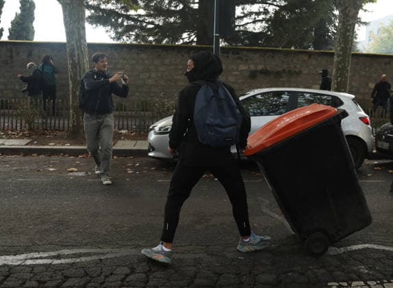 Student protest in Paris PARIS, FRANCE - OCTOBER 1: A Protester moves a garbage bin in a street amid clashes with French riot police during a protest near Lycee Paul Eluard high school in Saint-Denis, near Paris, France, on October 1, 2026. Mohamad Salaheldin Abdelghani Alsayed Anadolu Paris France. Editorial use only. Please get in touch for any other usage.  Copyright: x2026xAnadoluxMohamadxSalaheldinxAbdelghanixAlsayedx