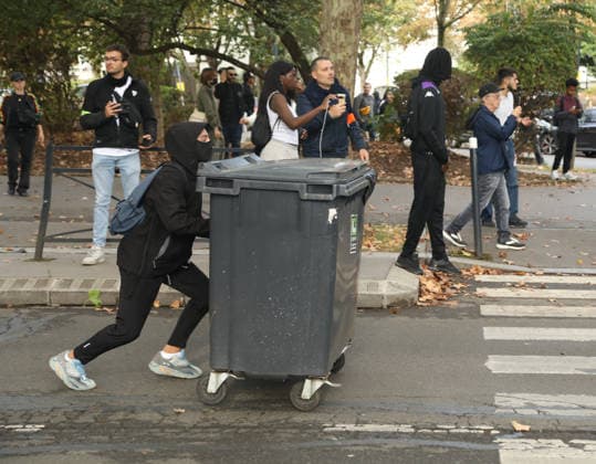 Student protest in Paris PARIS, FRANCE - OCTOBER 1: A Protester moves a garbage bin in a street amid clashes with French riot police during a protest near Lycee Paul Eluard high school in Saint-Denis, near Paris, France, on October 1, 2026. Mohamad Salaheldin Abdelghani Alsayed Anadolu Paris France. Editorial use only. Please get in touch for any other usage.  Copyright: x2026xAnadoluxMohamadxSalaheldinxAbdelghanixAlsayedx