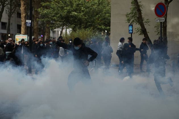 Student protest in Paris PARIS, FRANCE - OCTOBER 1: A Protester kicks tear gas canister amid clashes with French riot police during a protest by high school and university students near Lycee Paul Eluard high school in Saint-Denis, near Paris, France, on October 1, 2026. Mohamad Salaheldin Abdelghani Alsayed Anadolu Paris France. Editorial use only. Please get in touch for any other usage.  Copyright: x2026xAnadoluxMohamadxSalaheldinxAbdelghanixAlsayedx