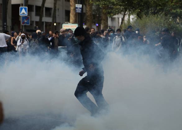 Student protest in Paris PARIS, FRANCE - OCTOBER 1: A Protester kicks tear gas canister amid clashes with French riot police during a protest by high school and university students near Lycee Paul Eluard high school in Saint-Denis, near Paris, France, on October 1, 2026. Mohamad Salaheldin Abdelghani Alsayed Anadolu Paris France. Editorial use only. Please get in touch for any other usage.  Copyright: x2026xAnadoluxMohamadxSalaheldinxAbdelghanixAlsayedx