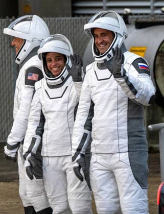 NASA s Crew-13 Astronaut Jessica Watkins, commander(C), Astronaut Luke Delaney(L),pilot, and Mission Specialist Sergey Teteryatnikov of Roscosmos (R) walk out of the operations building on their way to board as Dragon Spacecraft atop a SpaceX Falcon 9 rocket on SLC-40 at Kennedy Space Center, Florida on Thursday, October 1, 2026. They are on their way to the International Space Station. KSC2026100125 KATExBENIC