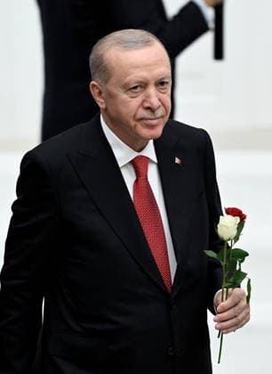 Turkish President Recep Tayyip Erdogan ANKARA, TURKIYE - OCTOBER 1: Turkish President Recep Tayyip Erdogan receives red and white rose from Leader of the Nationalist Movement Party (MHP) Devlet Bahceli (not seen) as he leaves the General Assembly Hall after addressing lawmakers during the opening of the 5th Legislative Year of the 28th Term of the Turkish Grand National Assembly (TGNA) in Ankara, Turkiye, on October 1, 2026. Rasit Aydogan Anadolu Ankara Turkey. Editorial use only. Please get in touch for any other usage.  Copyright: x2026xAnadoluxRasitxAydoganx