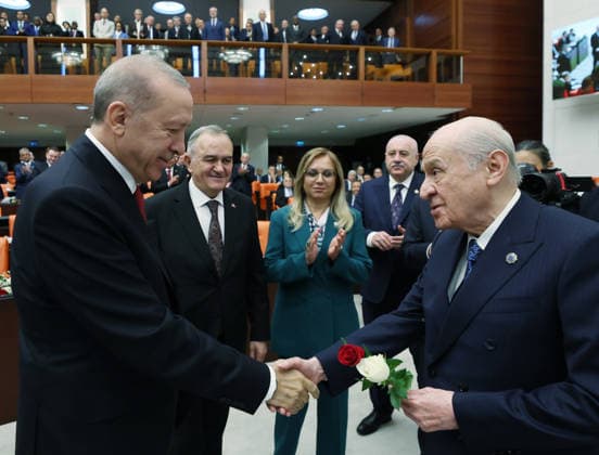 Opening Event of the 5th Legislative Year of the 28th Term of the Grand National Assembly of Turkiye ANKARA, TURKIYE - OCTOBER 1: (----EDITORIAL USE ONLY - MANDATORY CREDIT - TURKISH PRESIDENCY MURAT CETINMUHURDAR HANDOUT - NO MARKETING NO ADVERTISING CAMPAIGNS - DISTRIBUTED AS A SERVICE TO CLIENTS----)Turkiye s Nationalist Movement Party (MHP) leader Devlet Bahceli (R) presents red and white roses to Turkish President Recep Tayyip Erdogan (L) following his address to the General Assembly on the occasion of the opening of the 5th Legislative Year of the 28th Term at the Grand National Assembly of Turkiye (TBMM) in Ankara, Turkiye on October 1, 2026. Turkish Presidency Murat Cetinmuhurdar Handout Anadolu Ankara Turkey. Editorial u  Copyright: x2026xAnadoluxTurkishxPresidencyx MuratxCetinmuhurdarx xHandoutx