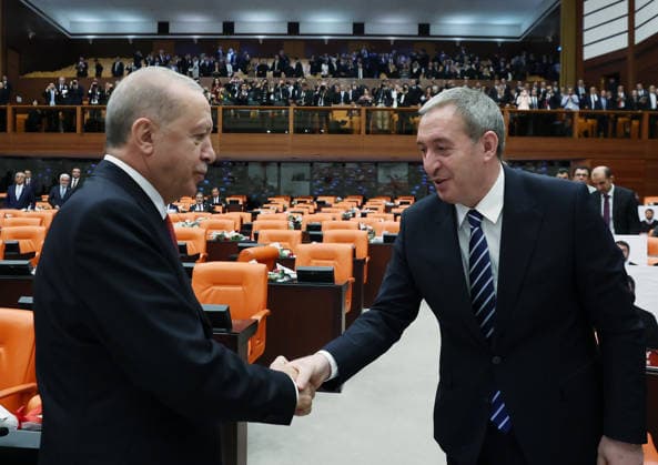 Opening Event of the 5th Legislative Year of the 28th Term of the Grand National Assembly of Turkiye ANKARA, TURKIYE - OCTOBER 1: (----EDITORIAL USE ONLY - MANDATORY CREDIT - TURKISH PRESIDENCY MURAT CETINMUHURDAR HANDOUT - NO MARKETING NO ADVERTISING CAMPAIGNS - DISTRIBUTED AS A SERVICE TO CLIENTS----) Turkish President Recep Tayyip Erdogan (L) shakes hands with DEM Party Co-Chair Tuncer Bakirhan (R) following his address to the General Assembly on the occasion of the opening of the 5th Legislative Year of the 28th Term at the Grand National Assembly of Turkiye (TBMM) in Ankara, Turkiye on October 1, 2026. Turkish Presidency Murat Cetinmuhurdar Handout Anadolu Ankara Turkey. Editorial use only. Please get in touch for any other  Copyright: x2026xAnadoluxTurkishxPresidencyx MuratxCetinmuhurdarx xHandoutx