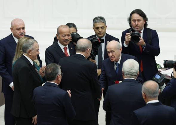 Opening Event of the 5th Legislative Year of the 28th Term of the Grand National Assembly of Turkiye ANKARA, TURKIYE - OCTOBER 1: (----EDITORIAL USE ONLY - MANDATORY CREDIT - TURKISH PRESIDENCY MURAT KULA HANDOUT - NO MARKETING NO ADVERTISING CAMPAIGNS - DISTRIBUTED AS A SERVICE TO CLIENTS----) Turkiye s Nationalist Movement Party (MHP) leader Devlet Bahceli (R) presents red and white roses to Turkish President Recep Tayyip Erdogan (L) following his address to the General Assembly on the occasion of the opening of the 5th Legislative Year of the 28th Term at the Grand National Assembly of Turkiye (TBMM) in Ankara, Turkiye on October 1, 2026. Turkish Presidency Murat Kula Handout Anadolu Ankara Turkey. Editorial use only. Please  Copyright: x2026xAnadoluxTurkishxPresidencyx xMuratxKulax xHandoutx