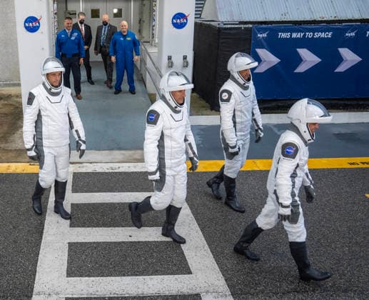 NASA s Crew-13 Astronaut Jessica Watkins, commander(R), Astronaut Luke Delaney , pilot, and Mission Specialists Joshua Kutryk(L) of the Canadian Space Agency and Sergey Teteryatnikov of Roscosmos walk out of the operations building on their way to board as Dragon Spacecraft atop a SpaceX Falcon 9 rocket on SLC-40 at Kennedy Space Center, Florida on Thursday, October 1, 2026. They are on their way to the International Space Station. KSC2026100136 PATxBENIC