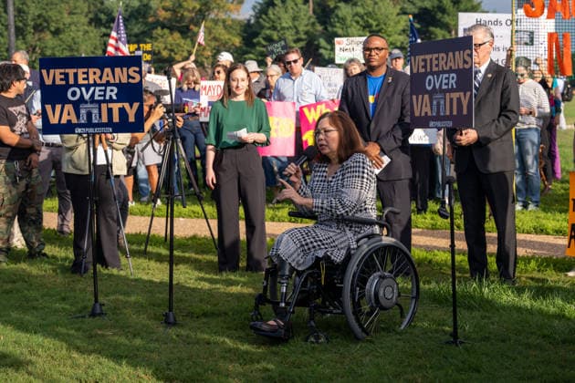 October 1, 2026, Washington, Dc, USA: Senator Tammy Duckworth (D-Illinois) speaks to protesters opposed to President Trumpâ€⠢s proposed arch outside of Arlington Cemetery on October 1, 2026. Washington USA - ZUMAl312 20261001_znp_l312_013 Copyright: xAndrewxLeydenx