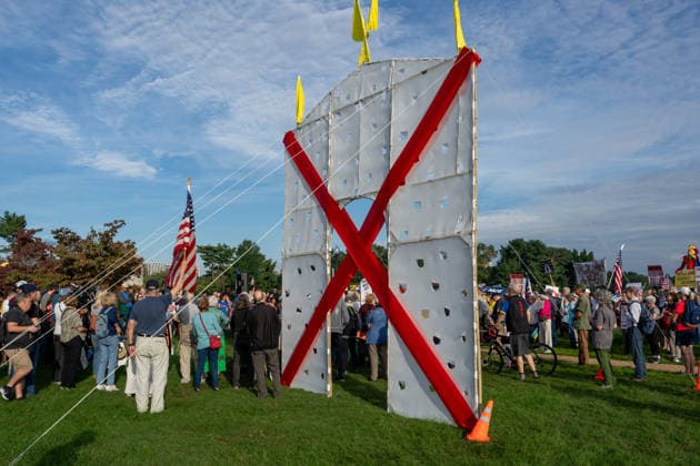 October 1, 2026, Washington, Dc, USA: Protesters opposed to President Trumpâ€⠢s proposed arch rally outside of Arlington Cemetery on October 1, 2026. Washington USA - ZUMAl312 20261001_znp_l312_022 Copyright: xAndrewxLeydenx