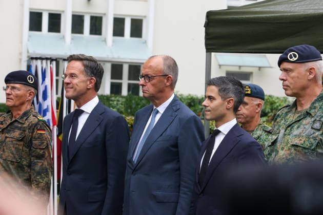 Meeting between the German Chancellor, the Prime Minister of the Netherlands, and the NATO Secretary General at the 1st German-Dutch Corps 20261001rw653 Military honors rendered by the 1st German-Dutch Corps Mark Rutte, NATO Secretary General, Friedrich Merz (CDU), Federal Chancellor; Rob Jetten (D66) Copyright: xRUEDIGERxWÖLKx