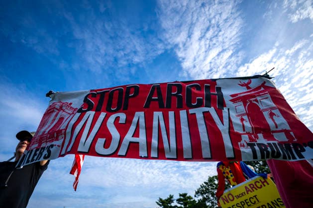 Veterans and activists gather to protest against President Donald Trump s planned 250-foot triumphal arch at Memorial Circle in Arlington, Virginia on Thursday, October 1, 2026. Activists argue that the arch, which the Trump administration plans to use as a military operations platform for drones and snipers, would obstruct the sightline between the Lincoln Memorial and Arlington National Cemetery.  WAP20261001320 BONNIExCASH
