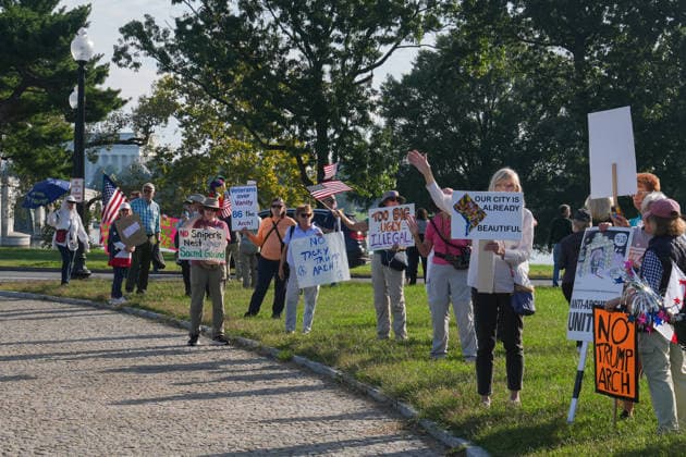 Demonstrators protest Trump’s proposed triumphal arch in Washington DC WASHINGTON, D.C., UNITED STATES - OCTOBER 01: Demonstrators protest against US President Donald Trump’s proposed triumphal arch at Memorial Circle in Washington, D.C., on October 01, 2026. Trump has said the planned structure, proposed near Arlington National Cemetery along the Potomac River, would include facilities for drones and snipers. The project is part of Trump’s efforts to reshape the US capital. Mehmet Eser Anadolu Washington, D.C. United States. Editorial use only. Please get in touch for any other usage. Copyright: x2026xAnadoluxMehmetxEserx