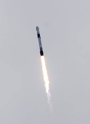 NASA s Crew-13 Mission Space X Falcon 9 streaks through the clouds as it launches from Launch Complex LC-40 at Cape Canaveral, Florida to the International Space Station on Thursday, October 1, 2026. Aboard the Dragon Spacecraft are Astronaut Jessica Watkins, commander, Astronaut Luke Delaney,pilot, and Mission Specialists Joshua Kutryk of the Canadian Space Agency and Sergey Teteryatnikov of Roscosmos  KSC2026100156 PATxBENIC
