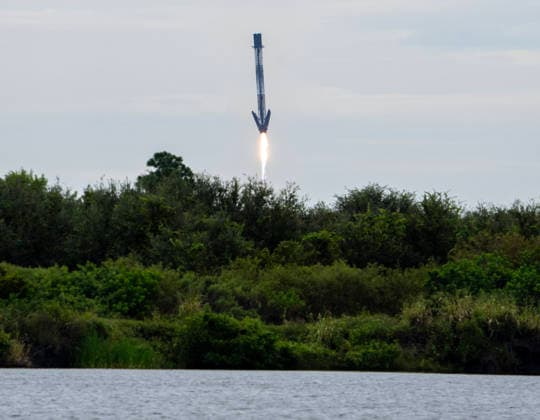 The solid rocket booster of the SpaceX Falcon 9 returns to LC-40 after launching NASA s Crew-13 Mission Space X Falcon 9 from Launch Complex LC-40 at Cape Canaveral, Florida to the International Space Station on Thursday, October 1, 2026. Aboard the Dragon Spacecraft are Astronaut Jessica Watkins, commander, Astronaut Luke Delaney,pilot, and Mission Specialists Joshua Kutryk of the Canadian Space Agency and Sergey Teteryatnikov of Roscosmos  KSC2026100158 PATxBENIC