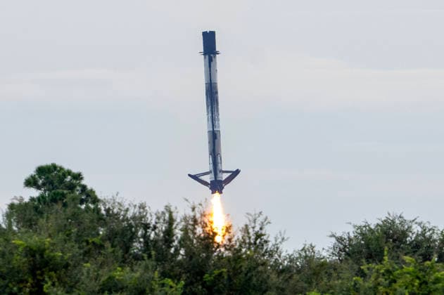 The solid rocket booster of the SpaceX Falcon 9 returns to LC-40 after launching NASA s Crew-13 Mission Space X Falcon 9 from Launch Complex LC-40 at Cape Canaveral, Florida to the International Space Station on Thursday, October 1, 2026. Aboard the Dragon Spacecraft are Astronaut Jessica Watkins, commander, Astronaut Luke Delaney,pilot, and Mission Specialists Joshua Kutryk of the Canadian Space Agency and Sergey Teteryatnikov of Roscosmos  KSC2026100159 PATxBENIC