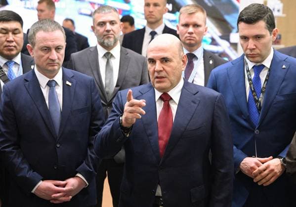 Belarus Russia 9255572 01.10.2026 Belarusian Prime Minister Alexander Turchin, Russian Prime Minister Mikhail Mishustin and Russian Minister of Industry and Trade Anton Alikhanov tour stands during the Innoprom. Belarus international industrial trade fair at the BelEXpo exhibition centre in Minsk, Belarus. Kirill Zykov Sputnik Minsk Belarus Copyright: xKirillxZykovx