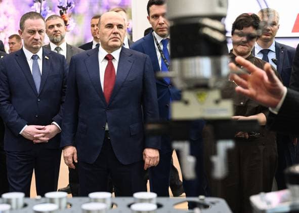 Belarus Russia 9255575 01.10.2026 Belarusian Prime Minister Alexander Turchin, Russian Prime Minister Mikhail Mishustin and Russian Minister of Industry and Trade Anton Alikhanov tour stands during the Innoprom. Belarus international industrial trade fair at the BelEXpo exhibition centre in Minsk, Belarus. Kirill Zykov Sputnik Minsk Belarus Copyright: xKirillxZykovx