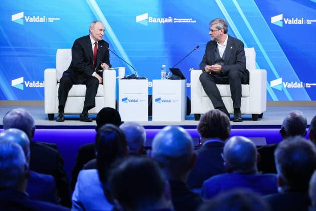 RUSSIA, MOSCOW REGION - OCTOBER 1, 2026: Russia s President Vladimir Putin (L) and Research Director of the Foundation for Development and Support of the Valdai Discussion Club, Editor-in-Chief of the Russia in Global Affairs Journal, Fyodor Lukyanov are seen during a plenary session titled Responsibility for the Future: Limits of the Possible or Possibilities Without Limit? at the 23th annual meeting of the Valdai Discussion Club in Istra Russia - ZUMAt113 20261001_zaa_t113_355 Copyright: xAlexanderxShcherbakx