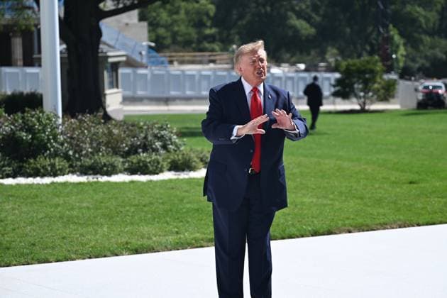 October 1, 2026, Washington, Dc, USA: U.S. President Donald Trump talks to the media before boarding Marine One on the South Lawn of the White House in Washington, DC, United States, on October 1, 2026. President Trump heads to Texas to visit Peterbilt Motors in Denton to highlight manufacturing and his economic agenda. Washington USA - ZUMAs197 20261001_aaa_s197_200 Copyright: xKylexMazzax