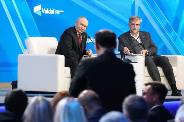 RUSSIA, MOSCOW REGION - OCTOBER 1, 2026: Russia s President Vladimir Putin and Research Director of the Foundation for Development and Support of the Valdai Discussion Club, Editor-in-Chief of the Russia in Global Affairs Journal, Fyodor Lukyanov (L-R back) are seen during a plenary session titled Responsibility for the Future: Limits of the Possible or Possibilities Without Limit? at the 23th annual meeting of the Valdai Discussion Club in Istra Russia - ZUMAt113 20261001_zaa_t113_394 Copyright: xAlexanderxShcherbakx