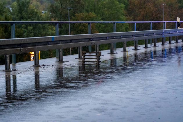 Traffic Accident on a Flooded Roadway; One Person Rescued from Ve