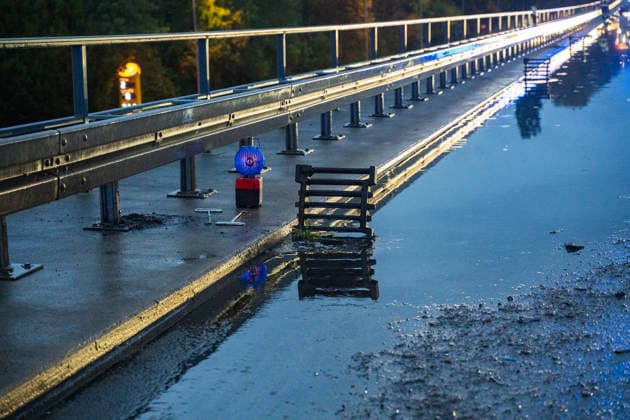 Traffic Accident on a Flooded Roadway; One Person Rescued from Ve